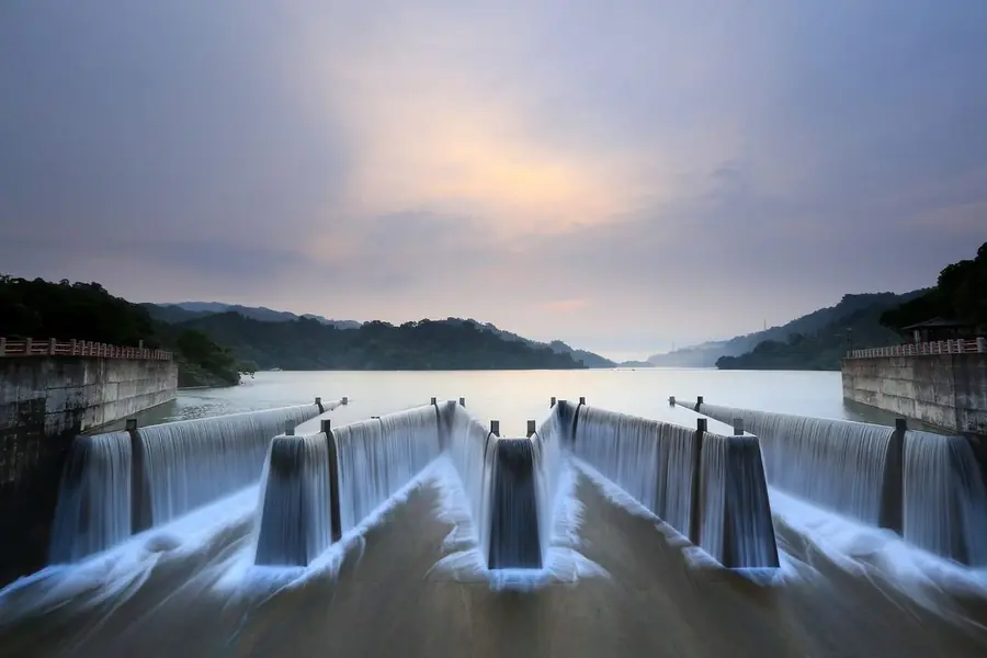 Dam spillways releasing water for hydropower