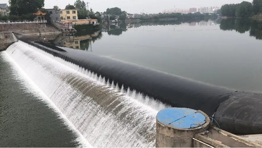 Water-filled rubber dam crest overflowing at Yuzhou Ying River project